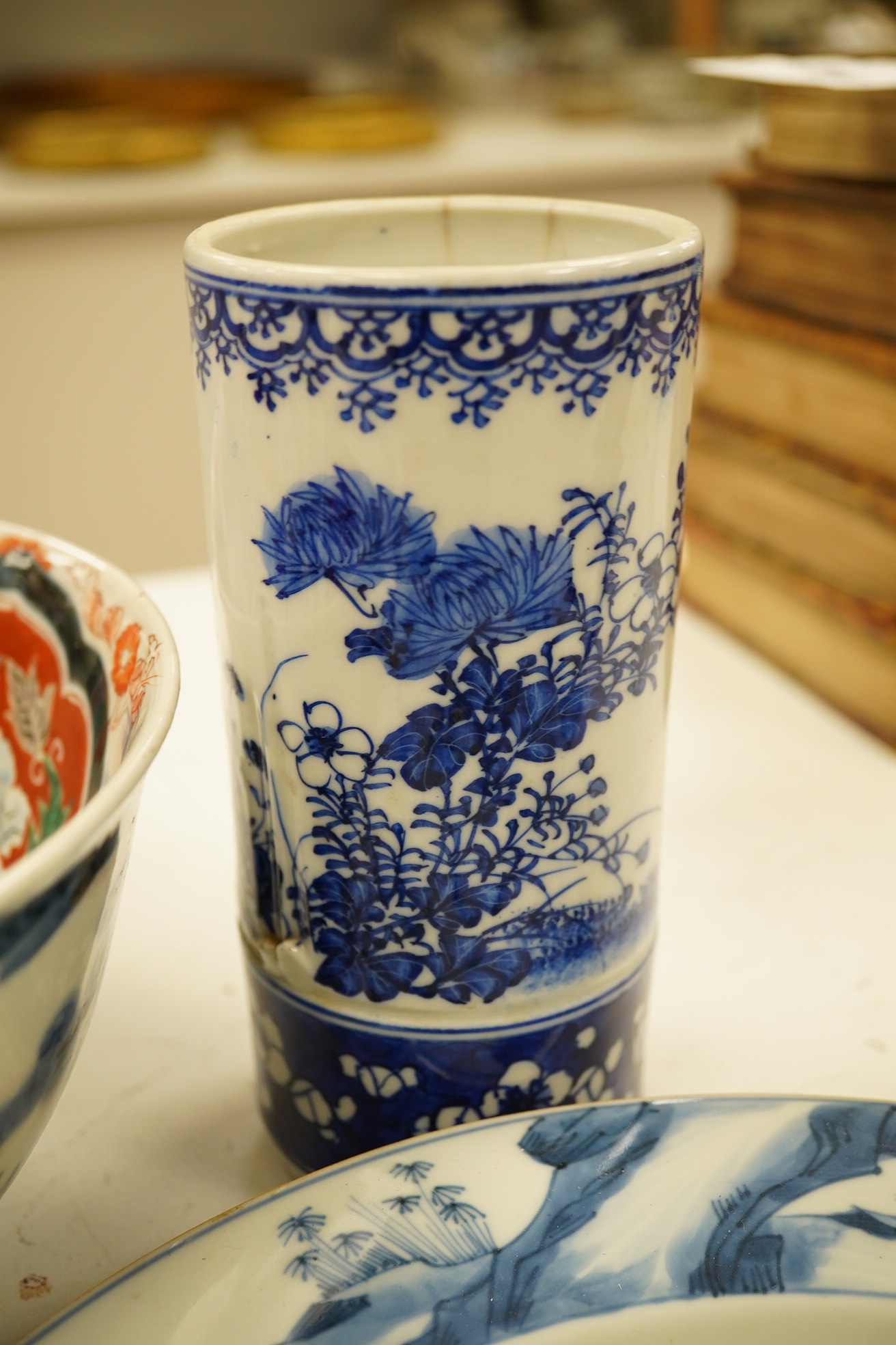 A pair of Chinese porcelain blue and white dishes, Kangxi, a pair of cylindrical vases and an Imari bowl (6). Condition - fair